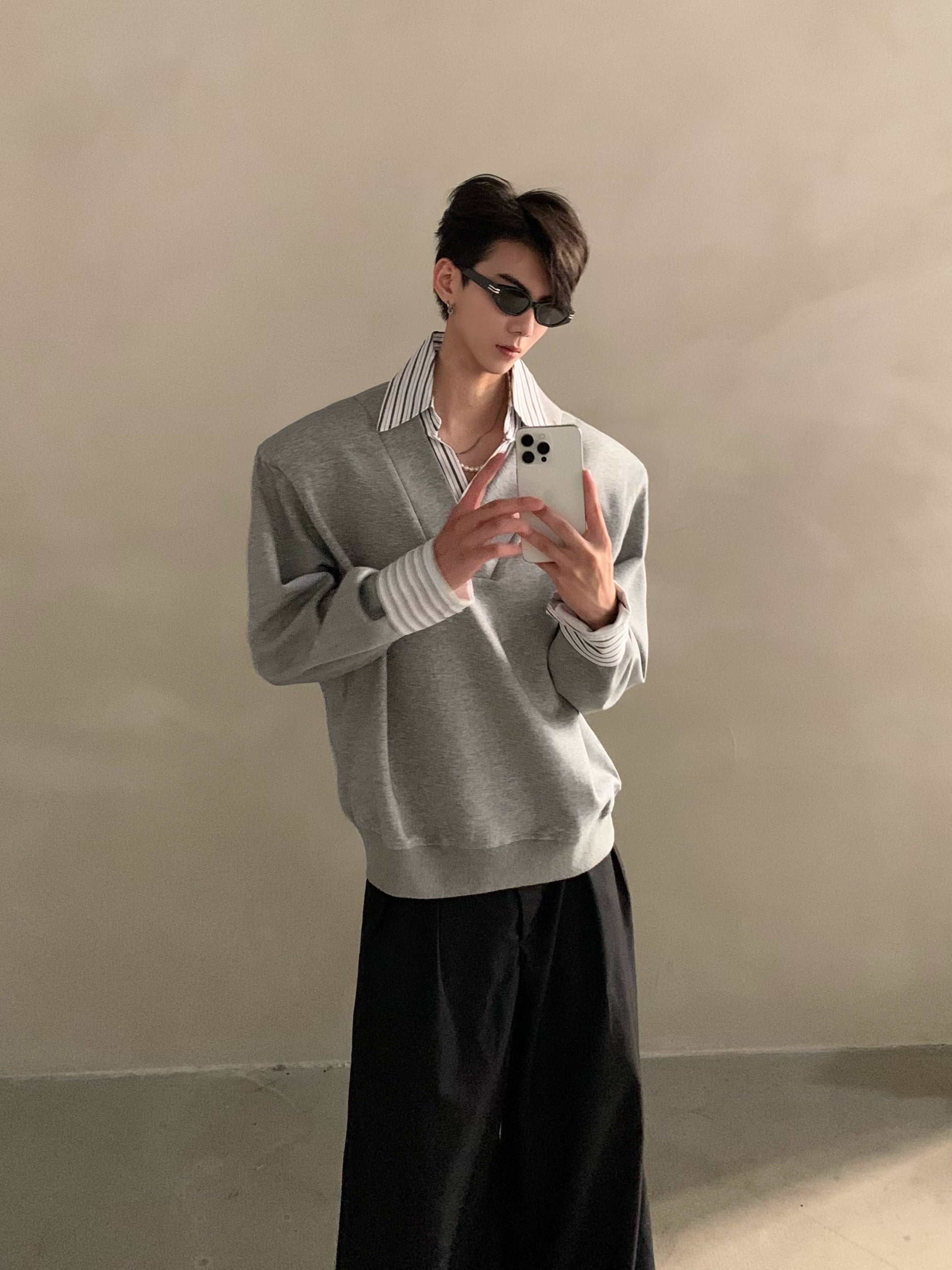 Niche design sense fake two-piece splicing sweater men's high-end sense ruffian handsome shirt collar long-sleeved top