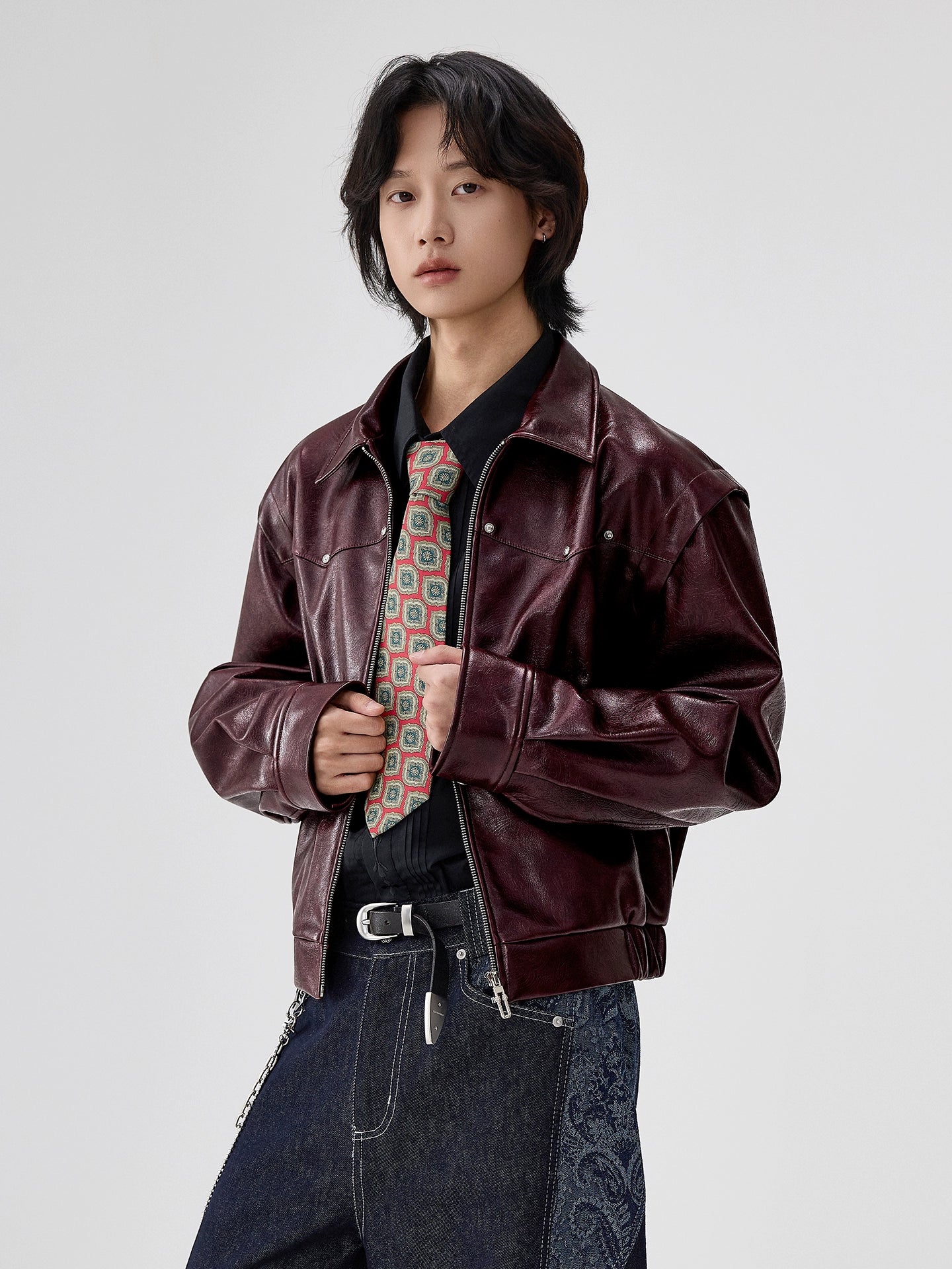 Court embossed silhouette PU leather short jacket men's lapel locomotive leather jacket autumn new