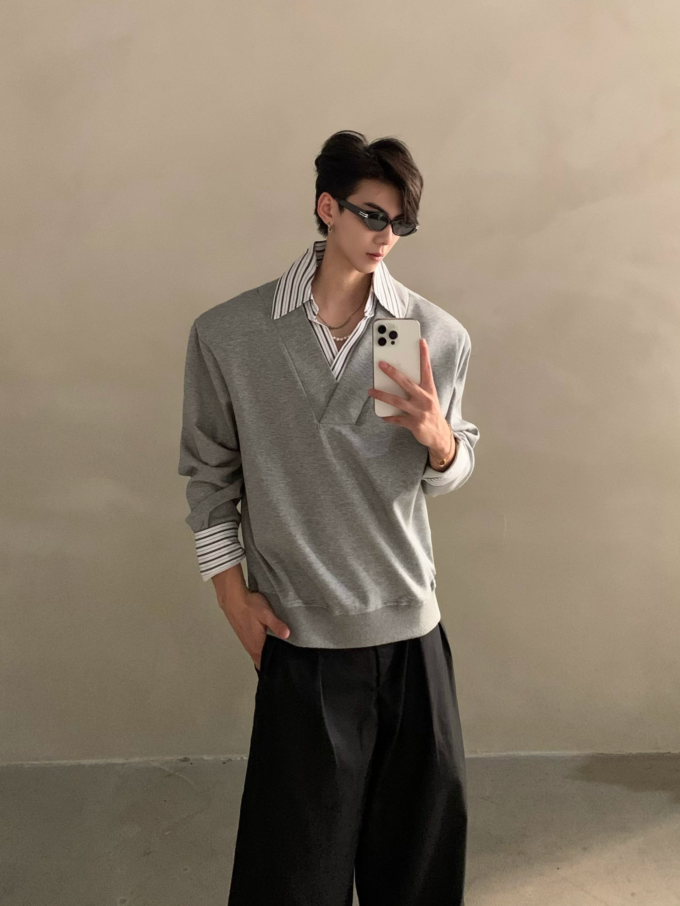 Niche design sense fake two-piece splicing sweater men's high-end sense ruffian handsome shirt collar long-sleeved top