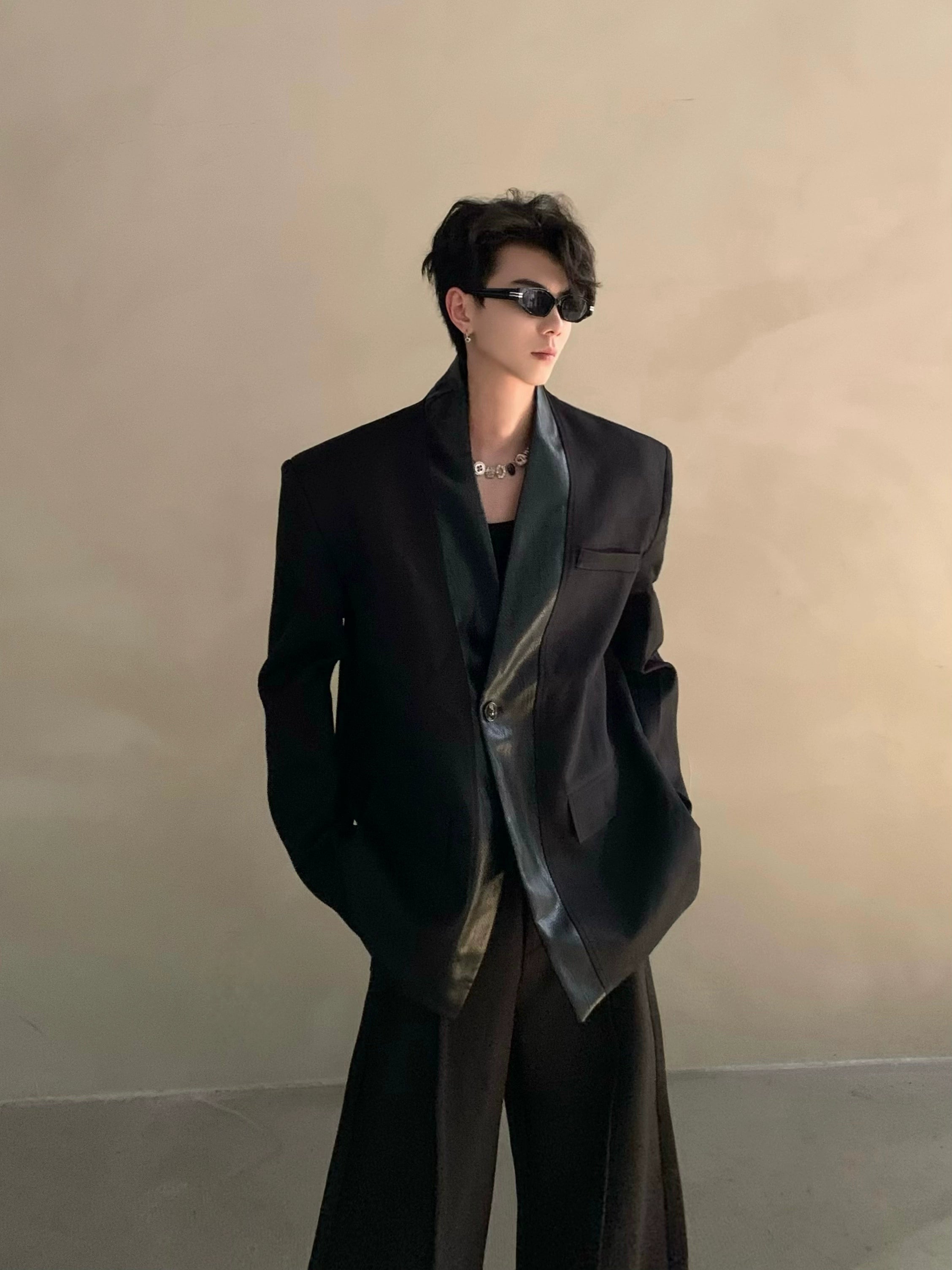 Autumn and winter black collarless suit splicing leather jacket profile shoulder pads light luxury ruffian handsome high-end jacket